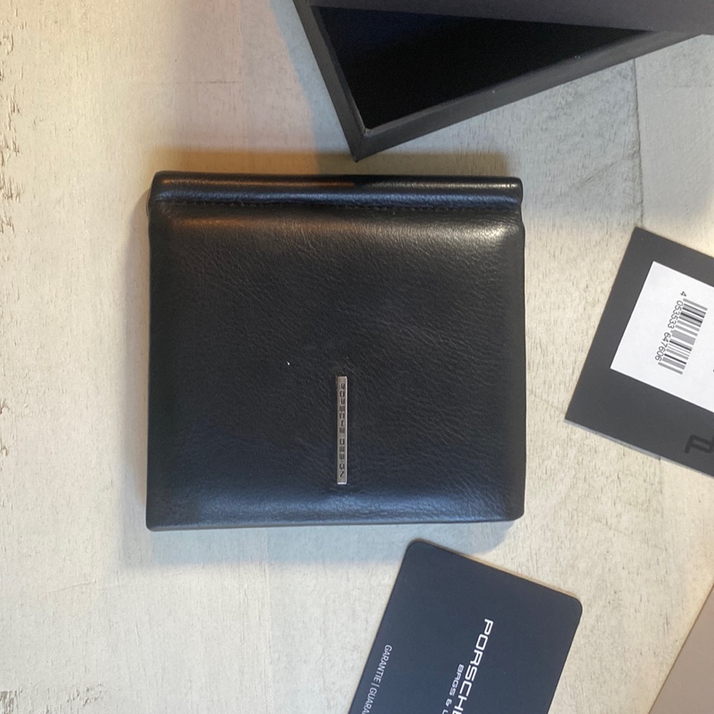 Men’s Leather Wallet by Porsche Design. Used for 4 months. Need a smaller wallet